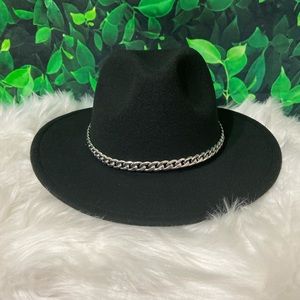 A hat with a silver chain around. It’s removable